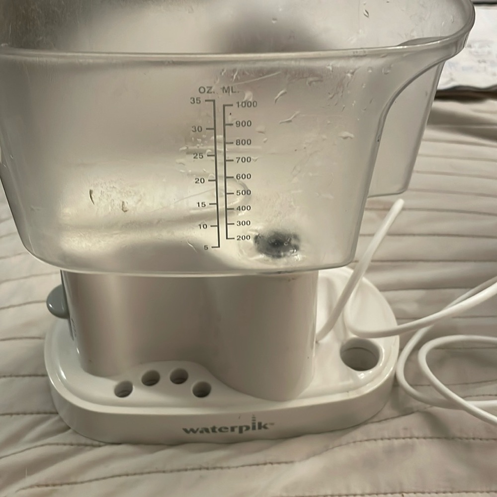 Water pix dental floss works fine needs cleaning and a new head teeth tooth